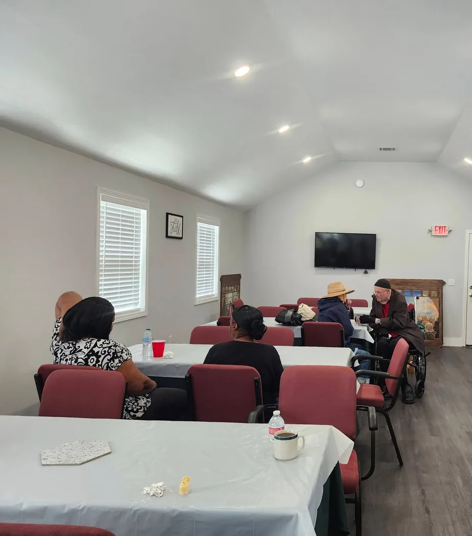 A fellowship meal in the Adkins Hall at St. Barnabas